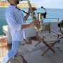 Saxofonista num iate privado em Vilamoura, no Algarve